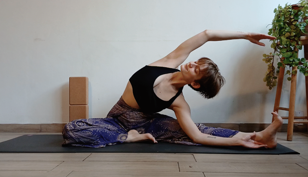 Women in purple doing hip opener